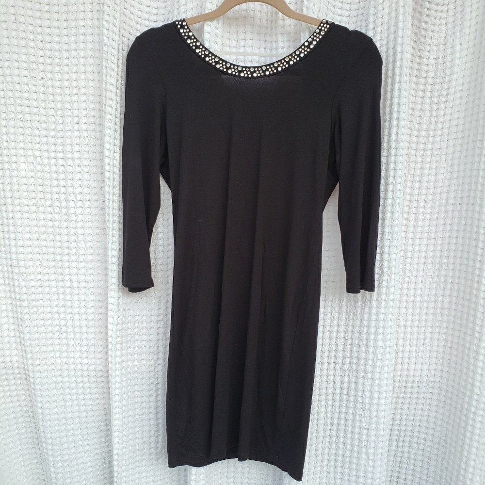 Little black dress with very low back